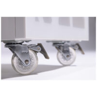 Enbio Trolley läpinäkyvillä pyörillä Lähikuva Enbio Trolley -läpinäkyvistä pyöristä harmaalla taustalla
