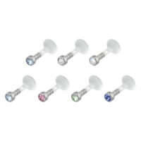 Koristeltu Push-Fit Labret kristalleilla Kuusi Push-Fit labretia kristalleilla eri väreissä valkoisella taustalla