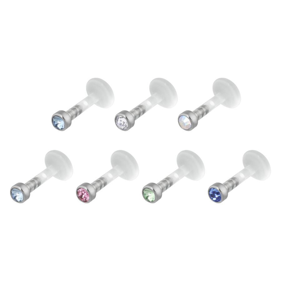 Koristeltu Push-Fit Labret kristalleilla Kuusi Push-Fit labretia kristalleilla eri väreissä valkoisella taustalla