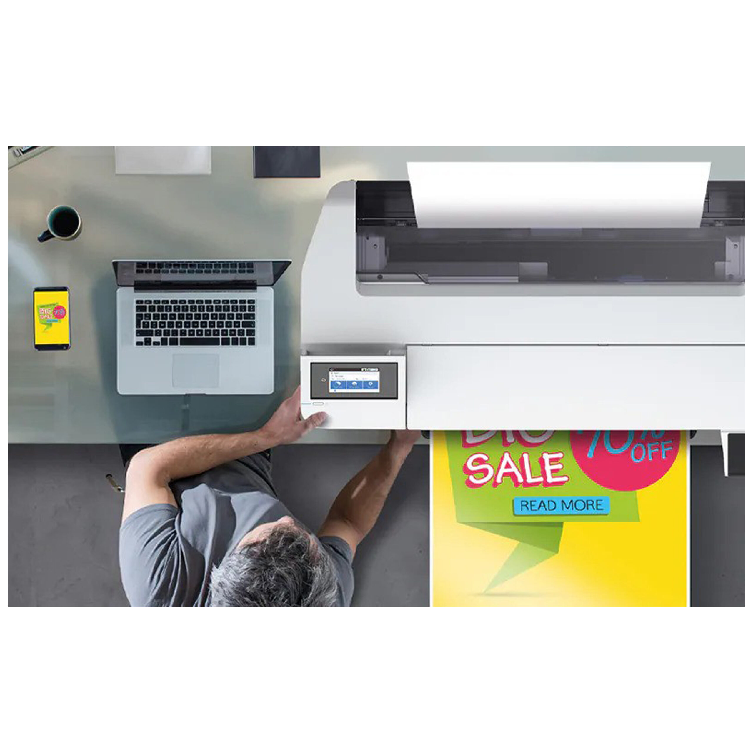 Epson SureColor SC-T3100x suurkokotulostin pöydällä kannettavan tietokoneen ja värillisen tulosteen kanssa