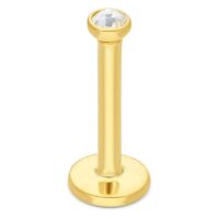 18K kultainen labret kristallinkirkkaalla kivellä Kultainen labret 750-kultaa kristallinkirkkaalla kivellä valkoisella taustalla