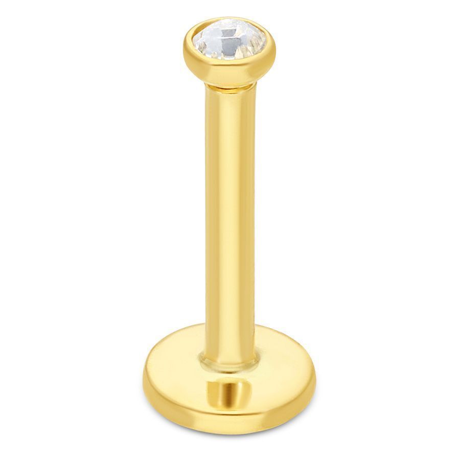 18K kultainen labret kristallinkirkkaalla kivellä Kultainen labret 750-kultaa kristallinkirkkaalla kivellä valkoisella taustalla