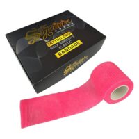 Pinkki Grip Bandage valkoisella taustalla mustan laatikon vieressä