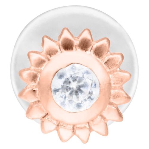 Ruusukultainen labret kristallilla valkoisella taustalla