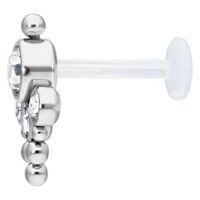 Bindi Push-fit Labret kirkkaalla kristallilla Bindi Push-fit Labret titaanista ja bioplastista kirkkaalla kristallilla valkoisella taustalla