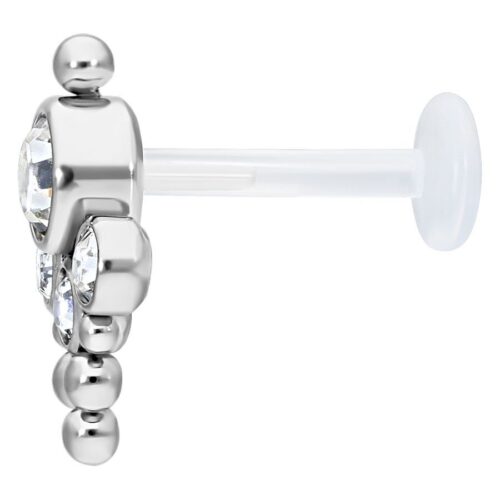 Bindi Push-fit Labret titaanista ja bioplastista kirkkaalla kristallilla valkoisella taustalla