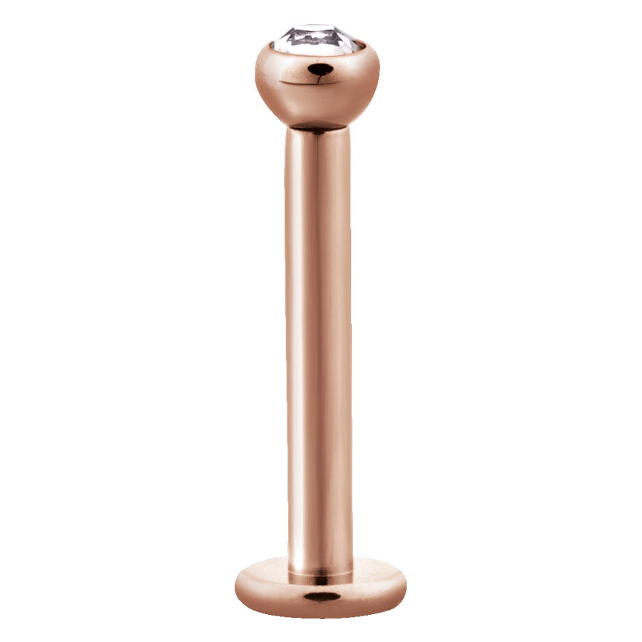 Ruusuinen Labret kristallilla Ruusuinen labret kirurginteräksestä kirkkaalla kristallilla valkoisella taustalla