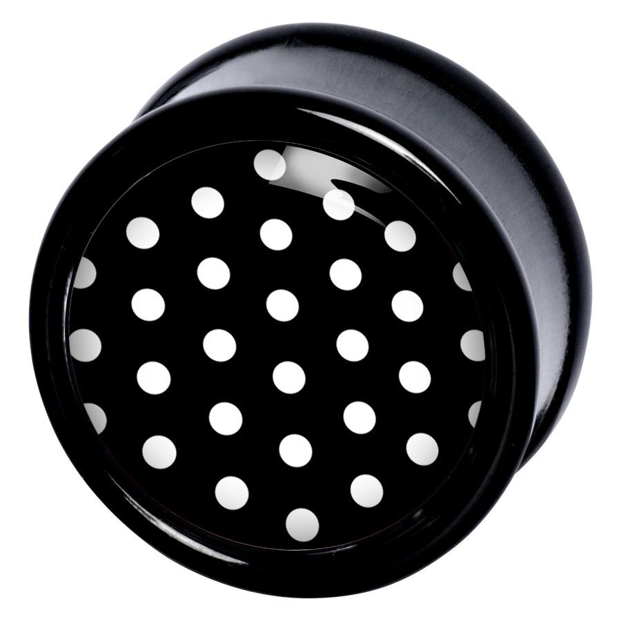 Musta plugi valkoisilla polka dotseilla Musta PMMA-plugi valkoisilla polka dotseilla mustalla taustalla