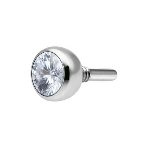 Hopeinen labret-lisäosa kirkkaalla kristallipallolla valkoisella taustalla
