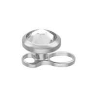 Hopeinen titaaninen dermal anchor kristallilla Hopeinen dermal anchor titaanista kirkkaalla kristallilla valkoisella taustalla