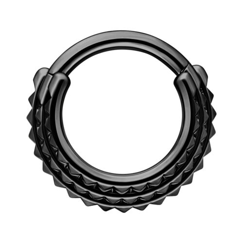 Musta septum clicker kolmella piikillä valkoisella taustalla