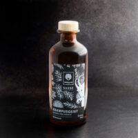 Wildcat Gin alkoholiton 0,35L pullo Ruskea lasipullo Wildcat-designilla tummalla taustalla