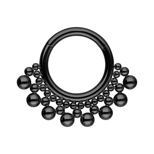 Musta septum clicker -rengas, jossa pallot ympyrän muodossa