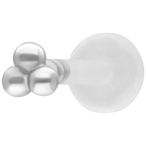 Hopeinen labret, jossa kolme palloa valkoisella taustalla