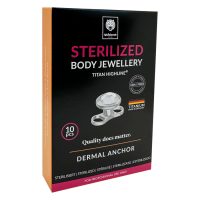 Steriloidun titaanisen Dermal Anchorin pakkaus kristallilla hopeassa mustalla taustalla