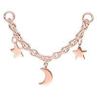 Moon & Stars lävistysketju ruusukullassa Ruusukultainen lävistysketju, jossa kuu ja tähdet valkoisella taustalla