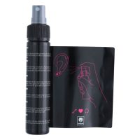 Wildcat Piercingspray-setti 60 ml ohjeineen Piercingspray-pullo ja ohje piirroksella valkoisella taustalla
