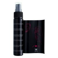 Piercingspray-setti 2x 60ml Musta Musta piercingspray-pullo ja pakkaus valkoisella taustalla