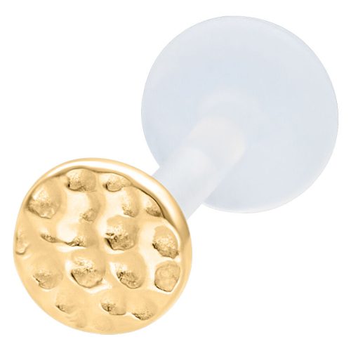 Kultainen labret vasaroidulla levyllä ja Push Fit valkoisella taustalla