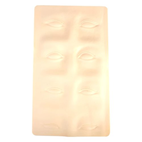 Beige silikonilevy kulmakarvapiirroksilla valkoisella taustalla