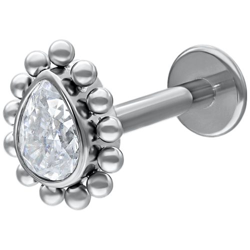 Valkokultainen labret pisaranmuotoisella kristallilla valkoisella taustalla